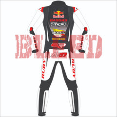 Back view of the Augusto Fernandez Red Bull Gasgas racing suit for the 2024 British GP. The suit features a black and white color scheme with red accents. Prominent logos include Red Bull, GASGAS, and sponsors such as Tech3, Motul, and Michelin displayed on the back. The rider's initials 'AF37' are visible at the lower back, and the suit includes red elbow sliders with 'Ruby' branding on the arms and legs
