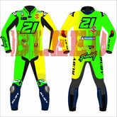 Franco Morbidelli's 2025 MotoGP racing suit, worn during the Barcelona winter test. The suit features a sleek design with the number 21 prominently displayed on the chest and back. It includes sponsor logos from Michelin and Bleed, and protective padding on the knees and elbows. The suit is predominantly neon green and yellow with black accents, and the brand name 'Bleed' is visible on the arms and legs."