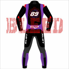 Back view of Jorge Martin's 2025 MotoGP racing suit, showcased during the Barcelona winter test. The suit boasts a bold design combining blue, white, and red, complemented by black accents. The number 89 is prominently positioned on both the chest and back. Various sponsor logos are featured, including Pramac Racing and Ducati. The suit is equipped with protective padding on the knees and elbows, along with additional branding on the arms and legs. Its design embodies a sleek, contemporary