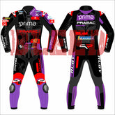 Front and back views of Jorge Martin's MotoGP racing suit. Showcasing a striking black, purple, red, and white design with sponsor logos from Pramac Racing and Ducati, protective knee and elbow padding, and the prominent number 89.