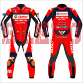 Complete front and back view of Luca Marini’s 2025 Honda Castrol MotoGP race suit in red and black, showing sponsor logos from Honda, Castrol, VR46, and Michelin, BLEED branding on sleeves and legs, armored knees, and MARINI label on the lower back.