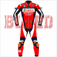Front profile of Luca Marini 2025 MotoGP race suit designed by BLEED, featuring Castrol Honda branding, VR46 patch, and signature 'M' logo on the leg in a red, white, and navy layout built for elite-level performance and rider safety.