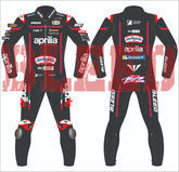 front and back image of Marco Bezzecchi's 2025 Aprilia MotoGP race suit, designed by BLEED. Features sponsor placements from Sterilgarda, Aprilia Racing, and Michelin, with reinforced padding on knees and the colorful 'BEZZ' graphic on the lower back.