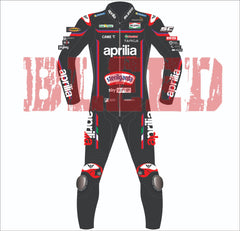 Front view of Marco Bezzecchi’s Aprilia MotoGP 2025 race suit in black with red and white accents, highlighting sponsor logos including Sterilgarda, Aprilia, and Sky WiFi, with BLEED branding on the collar and sleeves