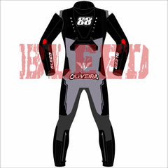 Back view of Miguel Oliveira’s Bleed 2025 MotoGP test suit, showcasing clean black and grey contrast, “88” logo with stars on the upper back, Oliveira name graphic at the waist, and red elbow patch highlights with Bleed branding.