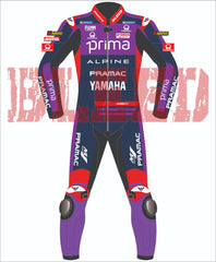 Front view of Miguel Oliveira’s MotoGP 2025 race suit in Yamaha Prima colors, detailed with Alpine, Pramac, and BLEED logos, and purple knee sliders on a dark blue and red base