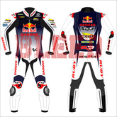 Front and back view of the Pedro Acosta Red Bull Gasgas racing suit for the 2024 British GP. The suit is predominantly white with black and red details, featuring logos from sponsors like Red Bull, GASGAS, Motul, Michelin, and Tech3. The design includes protective knee and elbow sliders, with the rider's initials 'acosta' displayed on the back.
