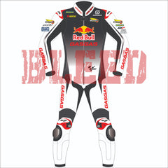 Front view of the Augusto Fernandez Red Bull Gasgas racing suit for the 2024 British GP. The suit is predominantly white with black and red detailing, featuring Red Bull and GASGAS logos on the chest, and various sponsor logos such as Motul, Michelin, and Akrapovic on the arms and shoulders. The design includes protective knee sliders with the rider's initials 'AF37' on the knees