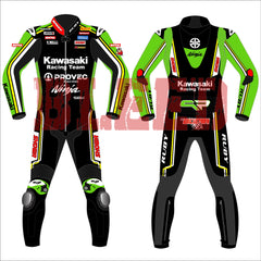 Front and back view of the Axel Bassani Kawasaki Racing Team suit for the 2024 WSBK season. The suit is primarily black with vibrant green and yellow accents, featuring the Kawasaki Racing Team logo on the chest. Sponsor logos, including Motul, Shoya, and Ruby, are displayed on the arms, shoulders, and legs. The design includes protective knee and elbow sliders, with the Ninja logo visible on the back