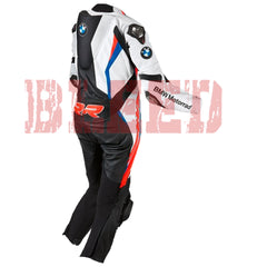 Side view of the BMW Double R Men's Motorbike Race Suit. The suit features white, black, red, and blue accents with prominent BMW Motorrad branding on the chest and sleeves. Designed for racing, it includes padded protection on the shoulders, elbows, and knees, combining safety with a sleek, aerodynamic design