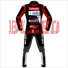 Francesco Bagnaia Ducati Motorcycle Riding Suit BritishGP 2024. The suit is predominantly black with red and white accents, featuring sponsor logos such as Lenovo, Monster, and NetApp. The design includes matching gloves and boots, emphasizing a professional and cohesive look for motorsport racing.