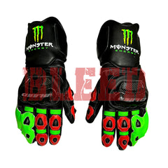 Front View of Monster Energy Racing Gloves with a sleek black design, highlighted by vibrant green and red accents. Featuring the iconic Monster Energy logo on the wrist and protective padding on the knuckles and fingers, these gloves are crafted from durable materials to provide superior grip and control, making them perfect for professional racers and motorsport enthusiasts.