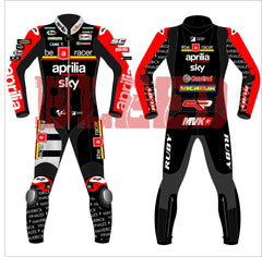 Front and back view of the 2024 Maverick Viñales Aprilia Racing suit design for British GP featuring a black, red, and white color scheme with prominent sponsor logos like Aprilia, Sky, Michelin. The suit showcases detailed graphics on the legs and arms, personalized for Maverick Viñales.