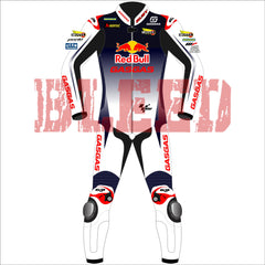 Front view of the Pedro Acosta Red Bull Gasgas racing suit for the 2024 British GP. The suit is predominantly white with black and red details, featuring logos from sponsors like Red Bull, GASGAS, Motul, Michelin, and Tech3. The design includes protective knee and elbow sliders, with the rider's initials 'acosta' displayed on the back.