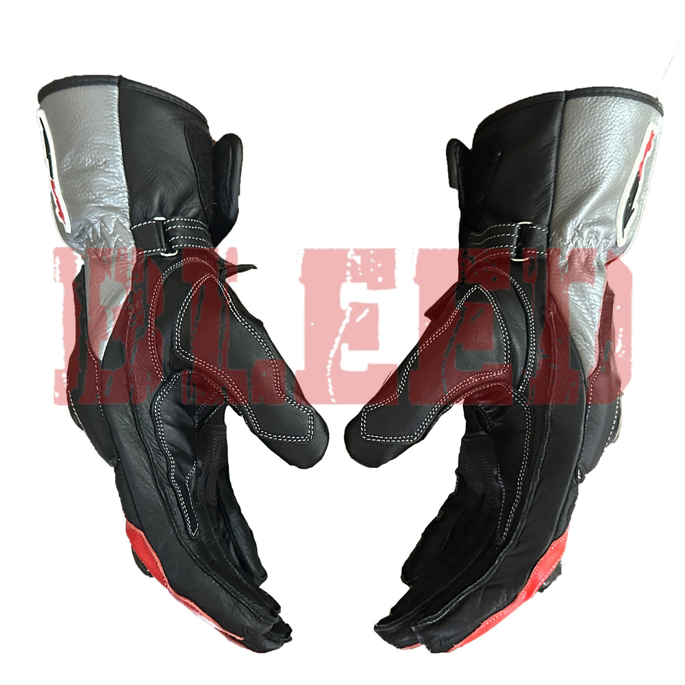 Side grip angle of Aprilia racing gloves showing ergonomic design, leather protection, and reinforced thumb panels by BLEED