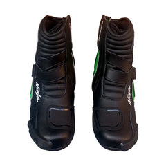Pair of black and lime green Kawasaki Ninja professional leather motorcycle racing boots featuring toe sliders, ankle protection, and reinforced gear shift pads.
