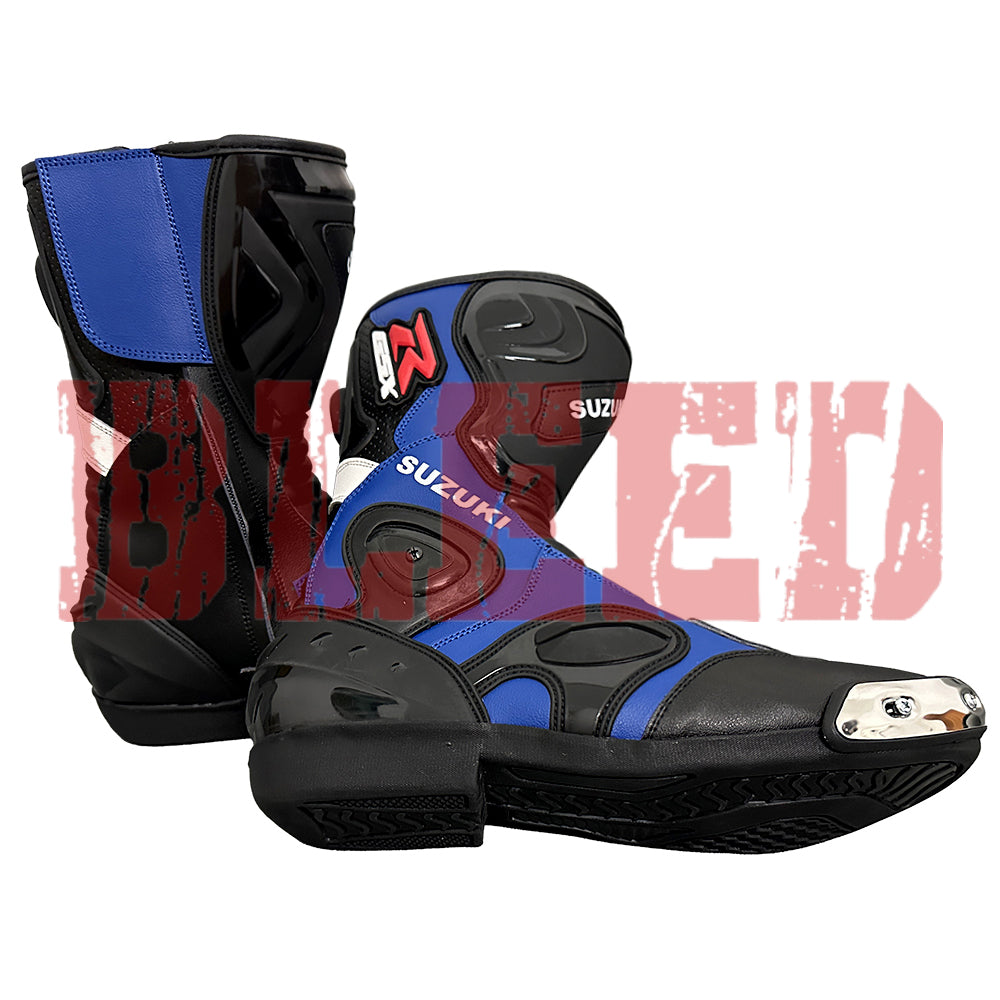 Side view of Suzuki blue and black motorcycle boots featuring reinforced ankle protection and steel toe sliders.
