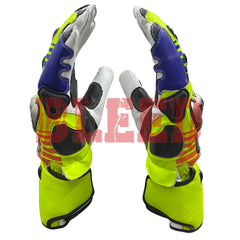 Side profile of a pair of Valentino Rossi 2016 MotoGP racing gloves, emphasizing their bold and vibrant yellow, blue, red, and black color scheme. The gloves feature reinforced protective elements, ergonomic design, and premium stitching, reflecting the high-performance standards of Rossi's 2016 racing gear.