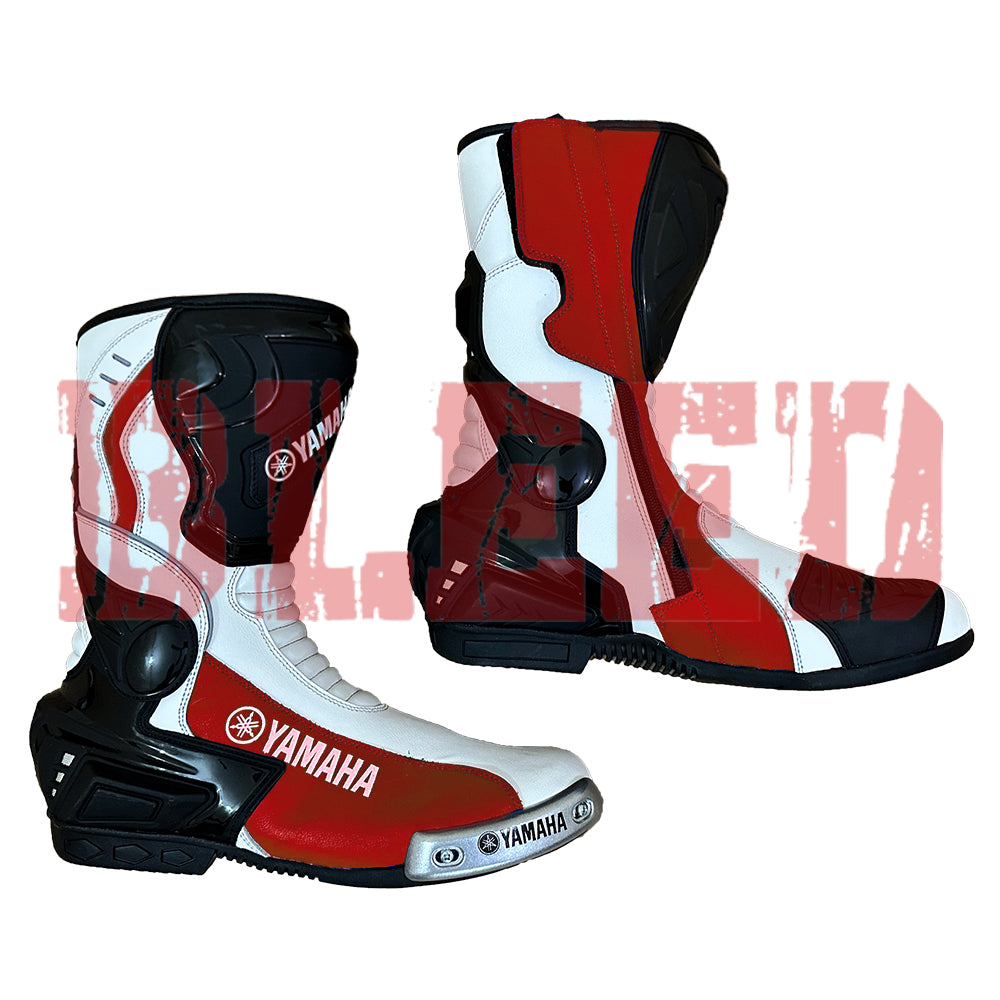 Pair of Yamaha leather motorcycle boots in red, white, and black showing full racing protection and premium finish.