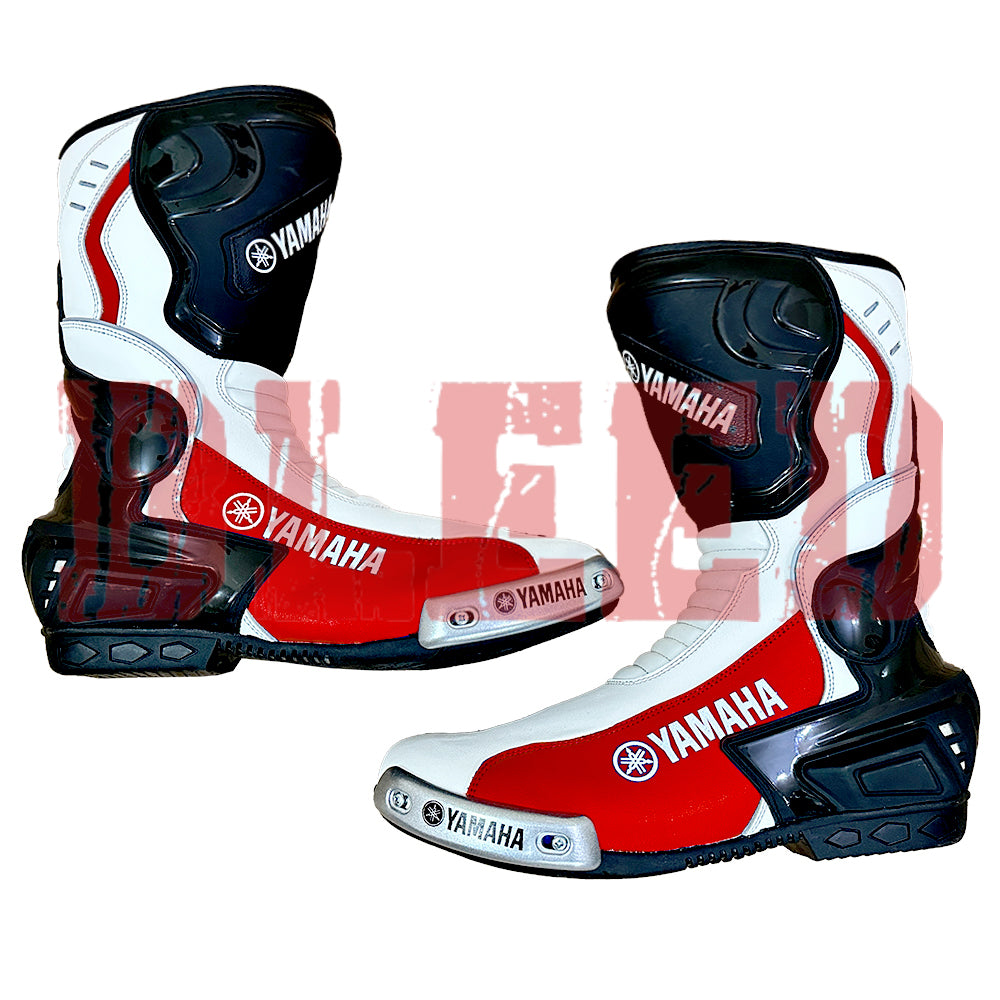 Side angle of Yamaha motorbike racing boots featuring aerodynamic design and durable metal sliders.
